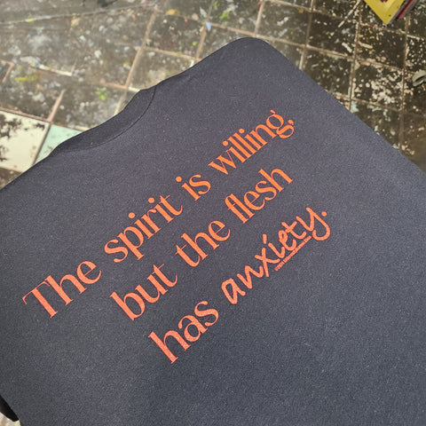 The Spirit is Willing, but the Flesh Has Anxiety - Unisex T-Shirt by Differently Normal